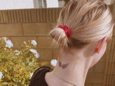 The tattoo is of wings and is on the back of the neck of Jane Widdop. 